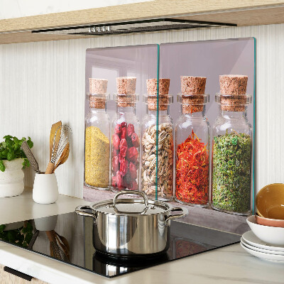 Glass kitchen board Spices in glass jars