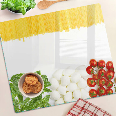 Glass chopping board Pasta with herbs and tomatoes