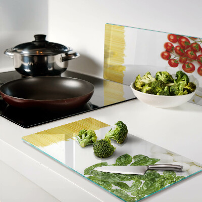 Glass chopping board Pasta with herbs and tomatoes