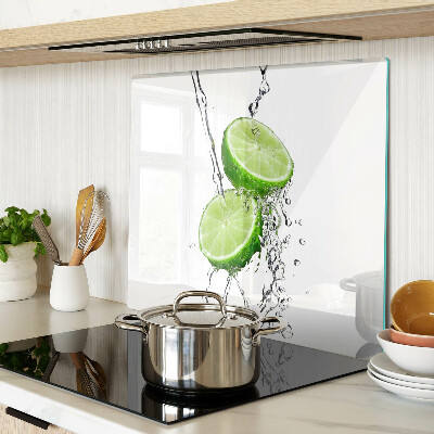 Glass kitchen board Lemons in water