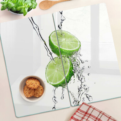 Glass kitchen board Lemons in water