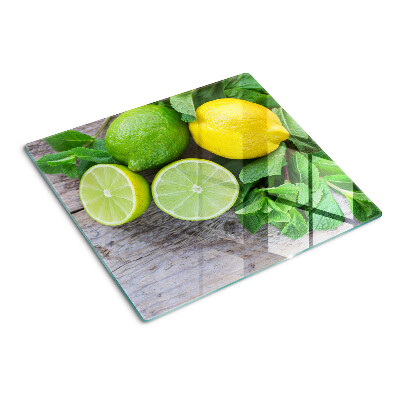Glass chopping board Lemons and limes with mint