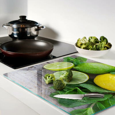 Glass chopping board Lemons and limes with mint