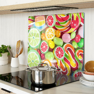 Glass kitchen board Sweet candies and fruits