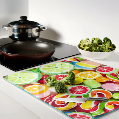 Glass kitchen board Sweet candies and fruits