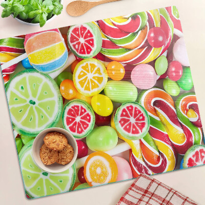 Glass kitchen board Sweet candies and fruits