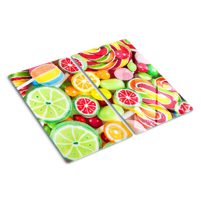 Glass kitchen board Sweet candies and fruits