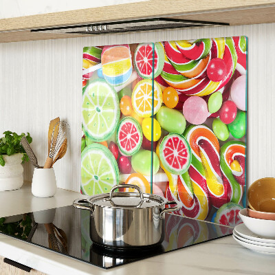 Glass kitchen board Sweet candies and fruits