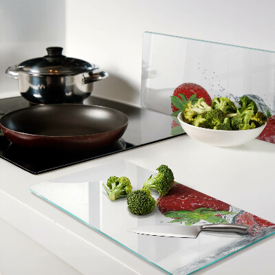 Glass kitchen board Strawberries in water