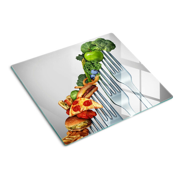 Glass kitchen board Food on a fork