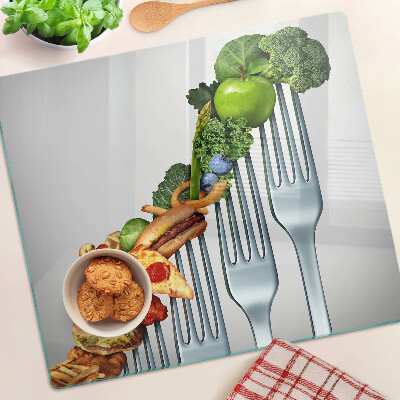 Glass kitchen board Food on a fork