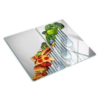 Glass kitchen board Food on a fork