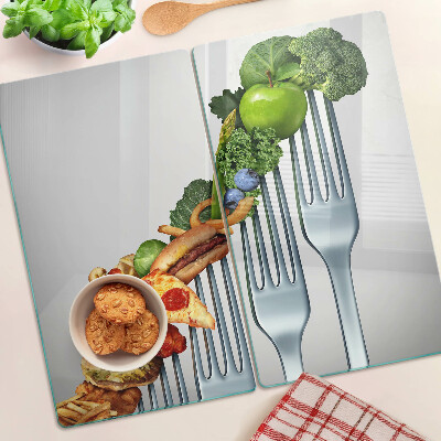 Glass kitchen board Food on a fork