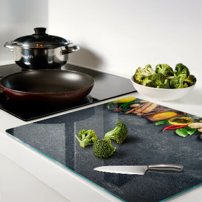 Glass kitchen board Kitchen spices and ingredients