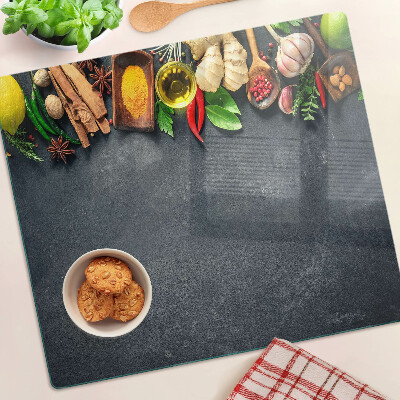 Glass kitchen board Kitchen spices and ingredients