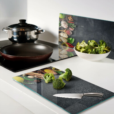 Glass kitchen board Kitchen spices and ingredients
