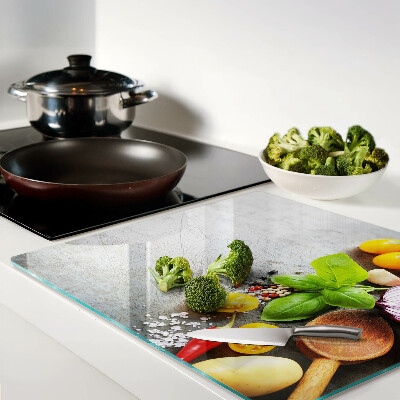 Glass chopping board Kitchen ingredients and herbs