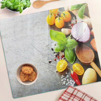Glass chopping board Kitchen ingredients and herbs