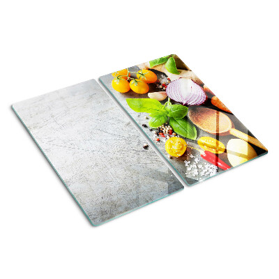 Glass chopping board Kitchen ingredients and herbs