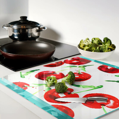 Glass chopping board Red cherries on a white background