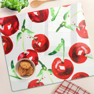 Glass chopping board Red cherries on a white background