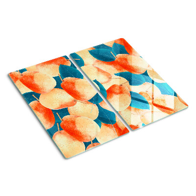 Glass chopping board Peaches against the background of leaves