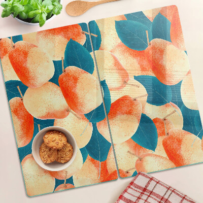 Glass chopping board Peaches against the background of leaves