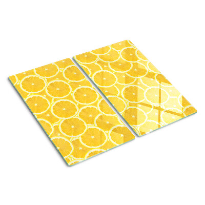 Glass kitchen board Lemon slices on a yellow background