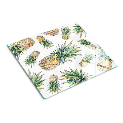 Glass chopping board Pineapples on a white background