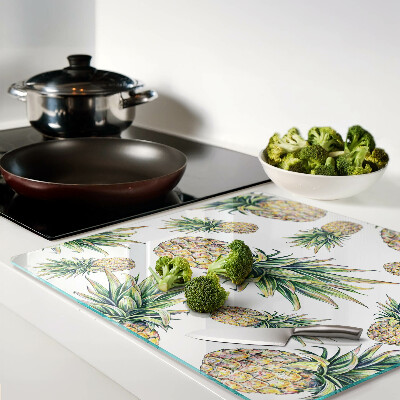 Glass chopping board Pineapples on a white background