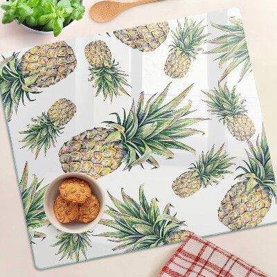 Glass chopping board Pineapples on a white background