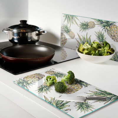 Glass chopping board Pineapples on a white background