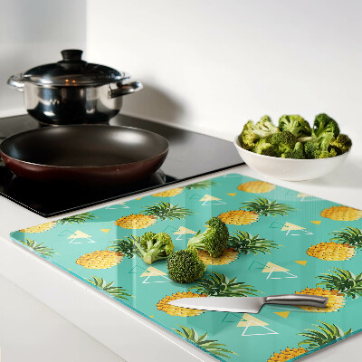 Glass chopping board Pineapples on a turquoise background