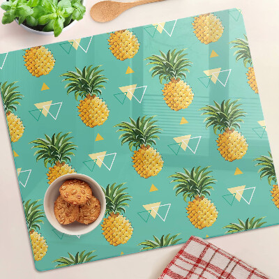 Glass chopping board Pineapples on a turquoise background
