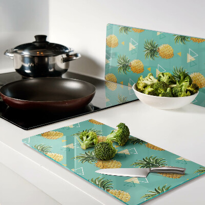 Glass chopping board Pineapples on a turquoise background
