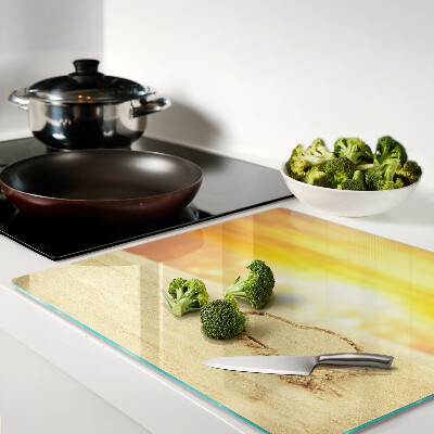 Glass kitchen board Beach at sunset