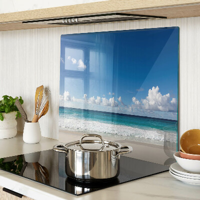 Glass kitchen board Beach with turquoise water and clouds