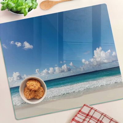 Glass kitchen board Beach with turquoise water and clouds