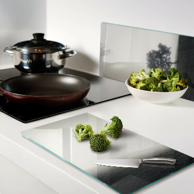 Glass chopping board A tree in a misty landscape
