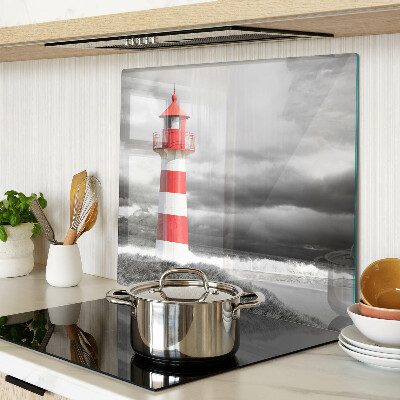 Glass kitchen board Lighthouse in the landscape