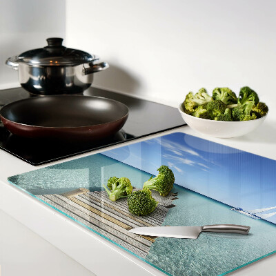 Glass kitchen board Pier over the turquoise sea