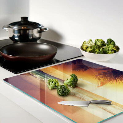 Glass kitchen board Sunset over the beach
