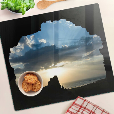 Glass kitchen board Sunset behind the clouds