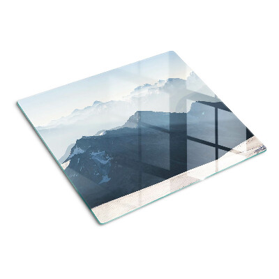 Glass kitchen board Mountain landscape in the clouds