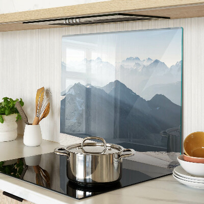 Glass kitchen board Mountain landscape in the clouds