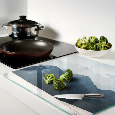 Glass kitchen board Mountain landscape in the clouds