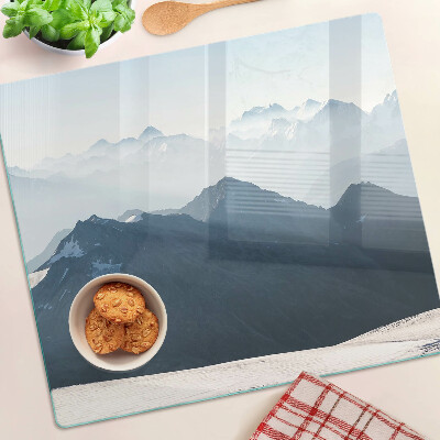 Glass kitchen board Mountain landscape in the clouds