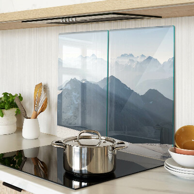 Glass kitchen board Mountain landscape in the clouds