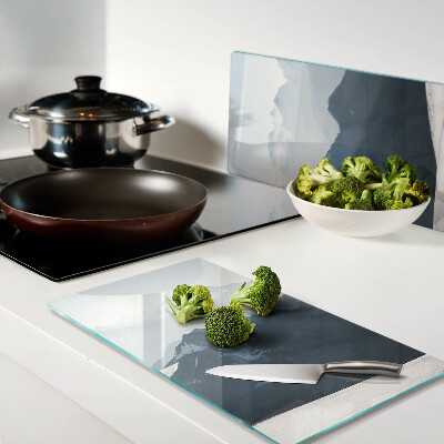 Glass kitchen board Mountain landscape in the clouds