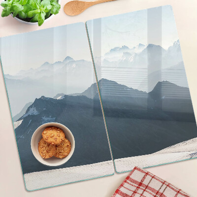 Glass kitchen board Mountain landscape in the clouds